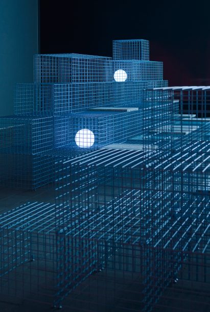 Spherical lights are placed within installation by Clap Studio