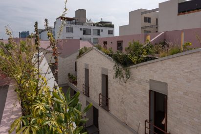 The team created triangular balconies that jut over a sidewalk