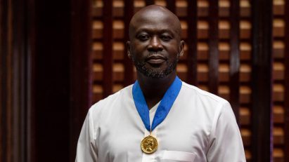 Adjaye wearing RIBA Royal Gold Medal