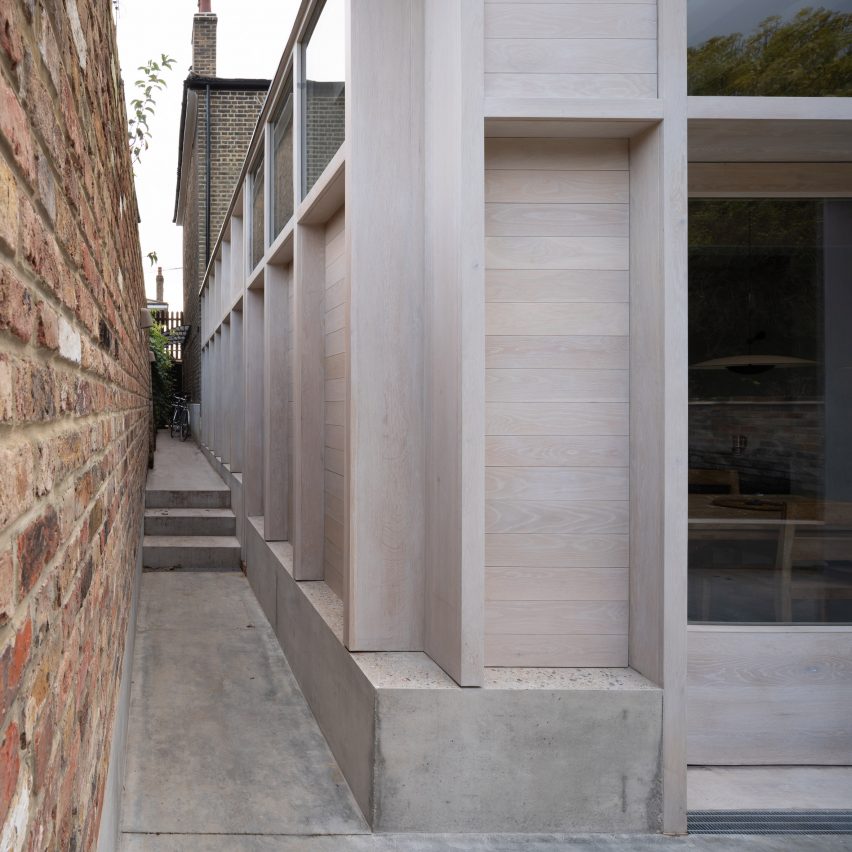 An alley way leads along side the home
