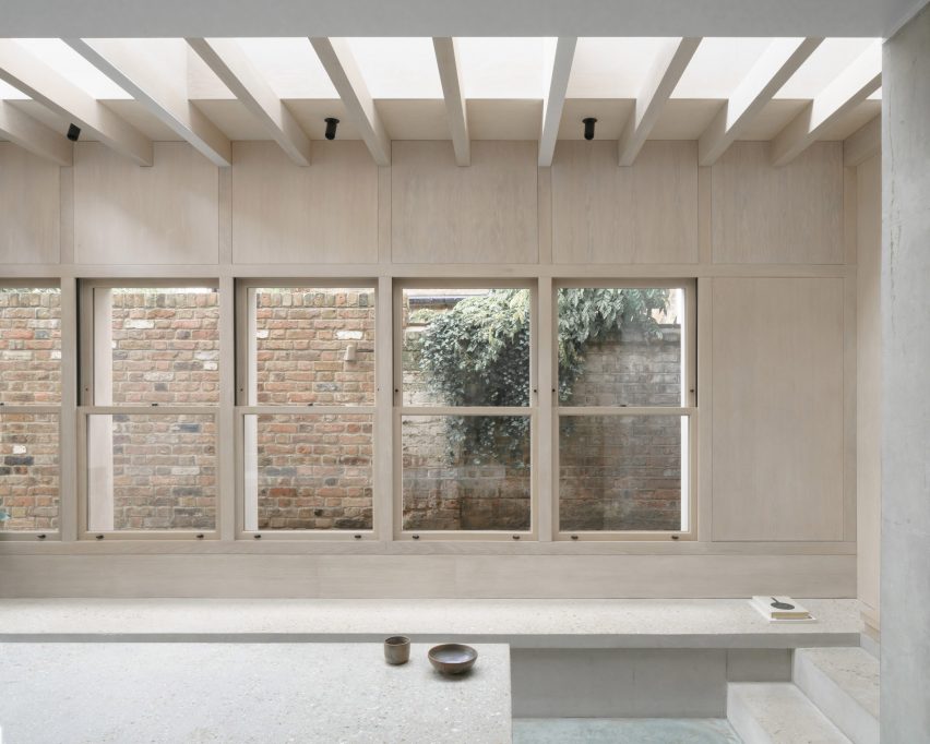 Windows line the walls of the extension
