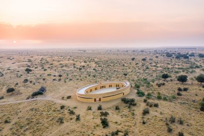 The school has an oval design by Diana Kellogg Architects
