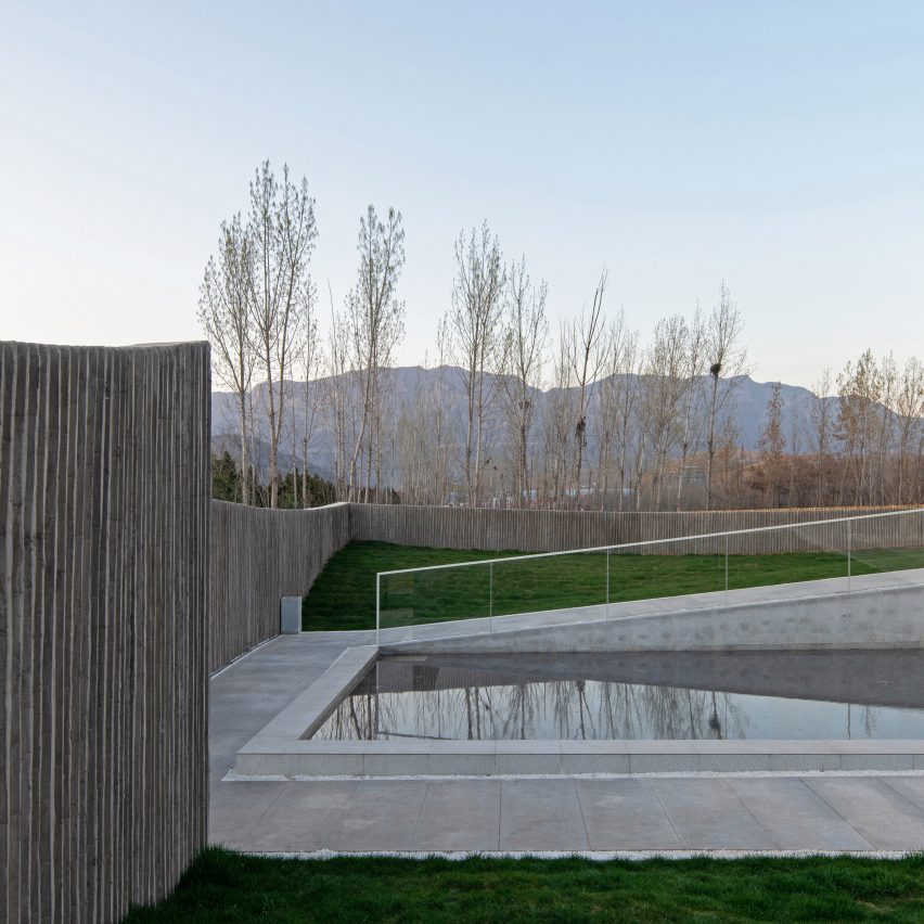The pool overlooks the mountains