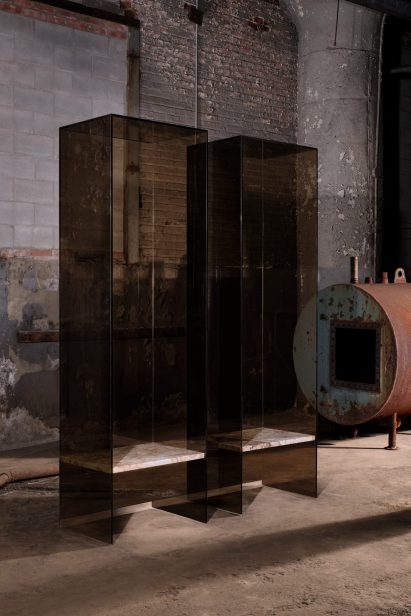 Throne-like chairs encased in glass