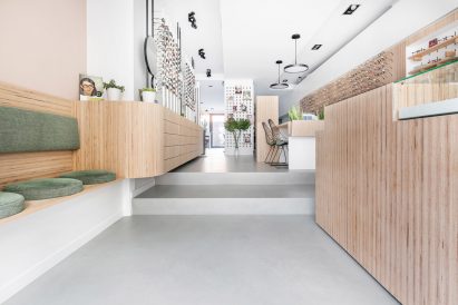 Ideal Work's Microtopping can be hand-finished with polished, silky, clouded or acid-stained effects