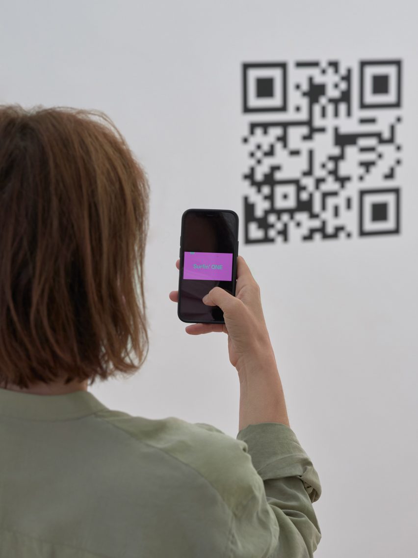 Woman scanning QR code