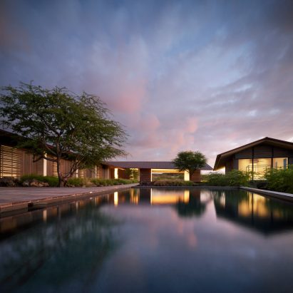 Sunset behind Hale Mau-u house and pool