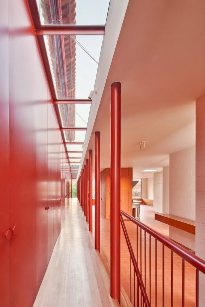 Corridor in red House in Sant Antoni de Vilamajor by Arquitectura-G