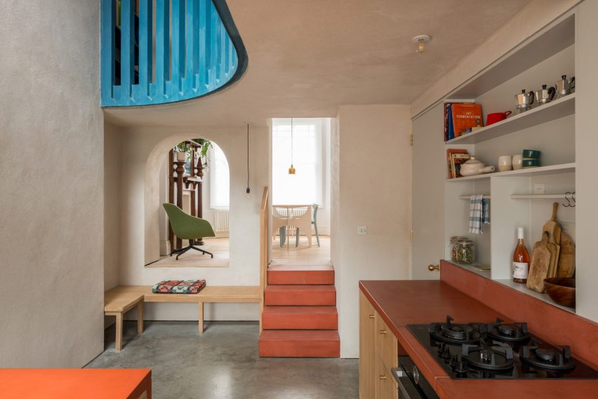 A living space is connected to the kitchen
