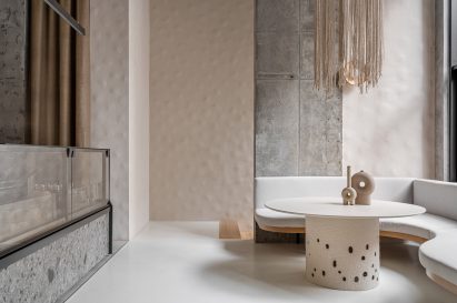 Overview of Kyiv eatery by Yakusha Design with dimpled clay walls