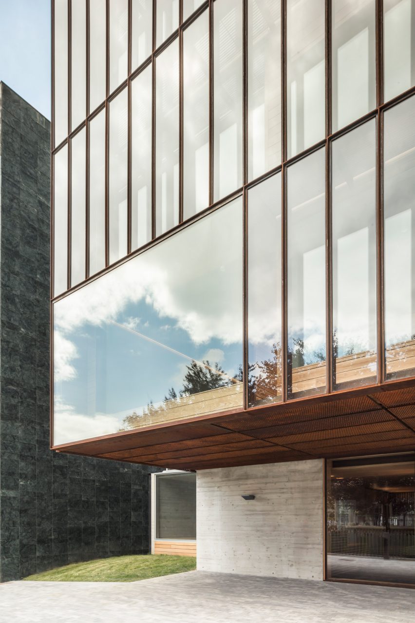 The facade is gridded with steel
