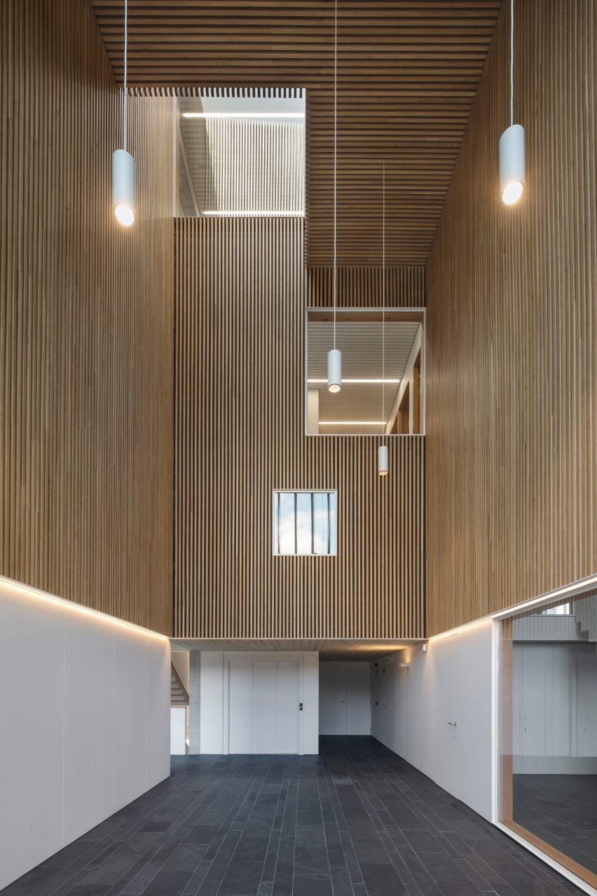 It has a white and wood material palette