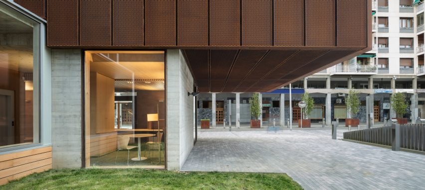 Floor-to-ceiling windows provide views in and out of the building