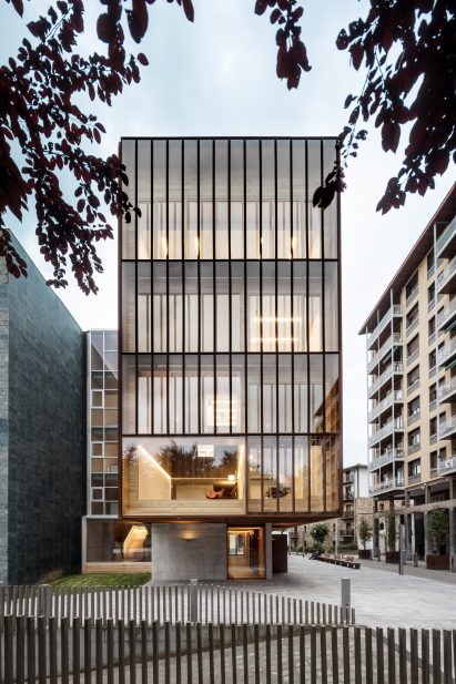 The school building has a gridded facade
