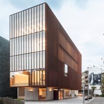 The school has a glass and steel exterior