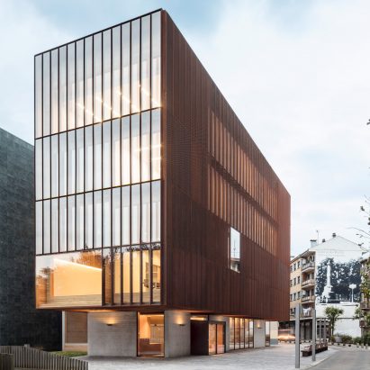 The school has a glass and steel exterior