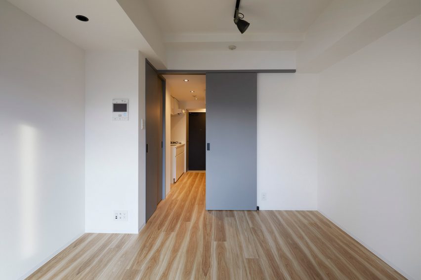 The apartments have grey doors