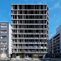 The building has a gridded exterior