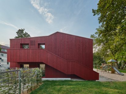 A staircase leads up the exterior of KiTa Parkstrasse