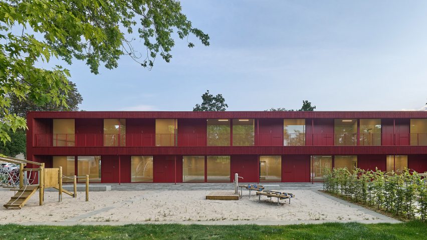 The kindergarten has a red exterior