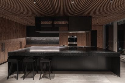 Leckie Studio inserted a kitchen into the lower level