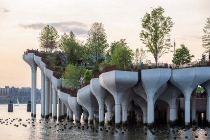 Concrete piers and trees of a park in New York