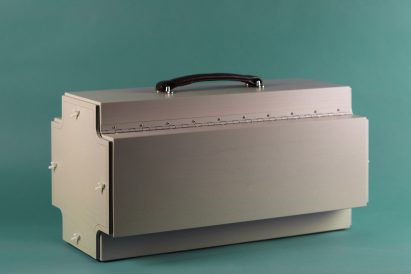 Synthesiser folded up into a toolbox-like case