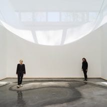 A sheet drapes across the interior of the Danish Pavilion