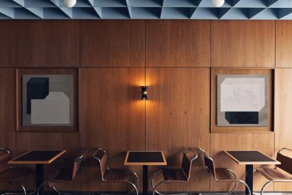 Wood-paneleld walls with MR10 tubular steel chairs by Mies van der Rohe in restaurant by Child Studio