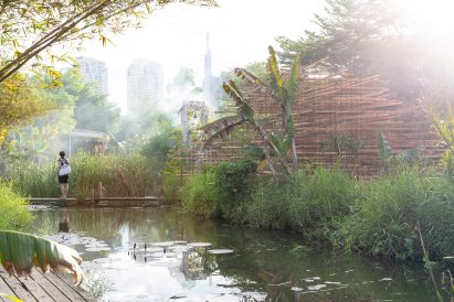The Straw Pavilion by MIA Design Studio blends into its surroundings