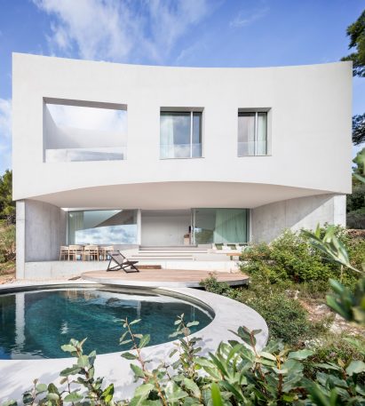 The home has a pool at the rear