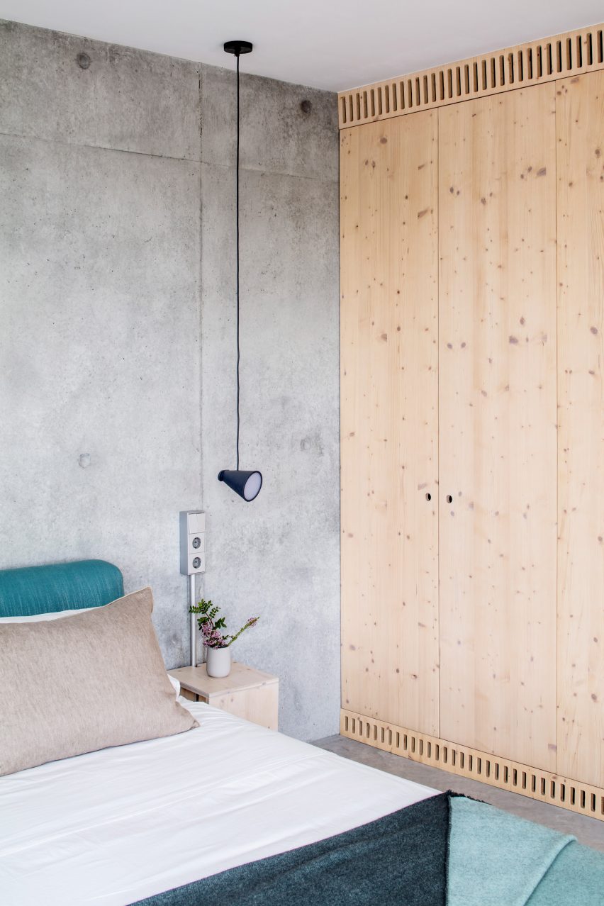 Wood panelling also covers the walls of bedrooms