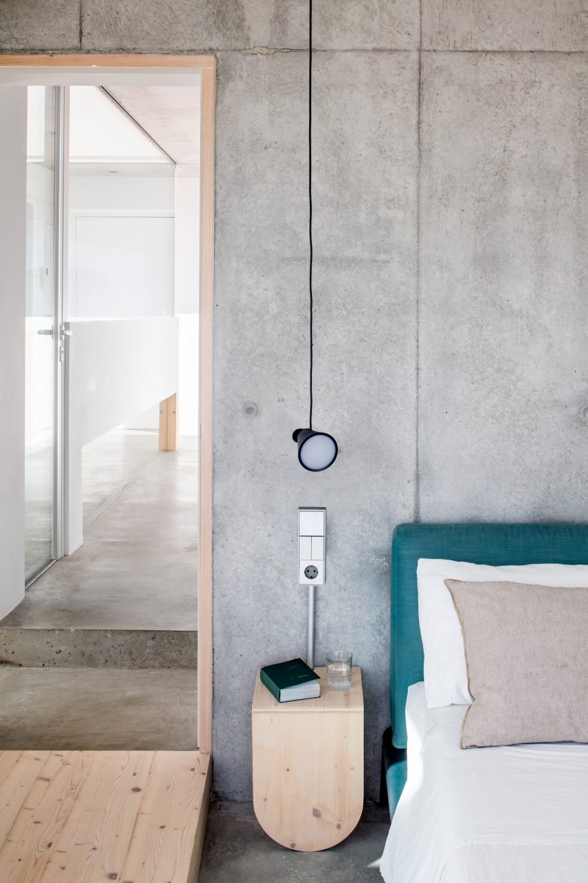 Bedrooms have exposed concrete walls