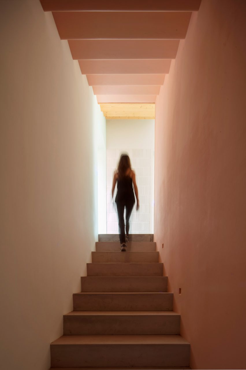 A staircase was finished with a terracotta hue