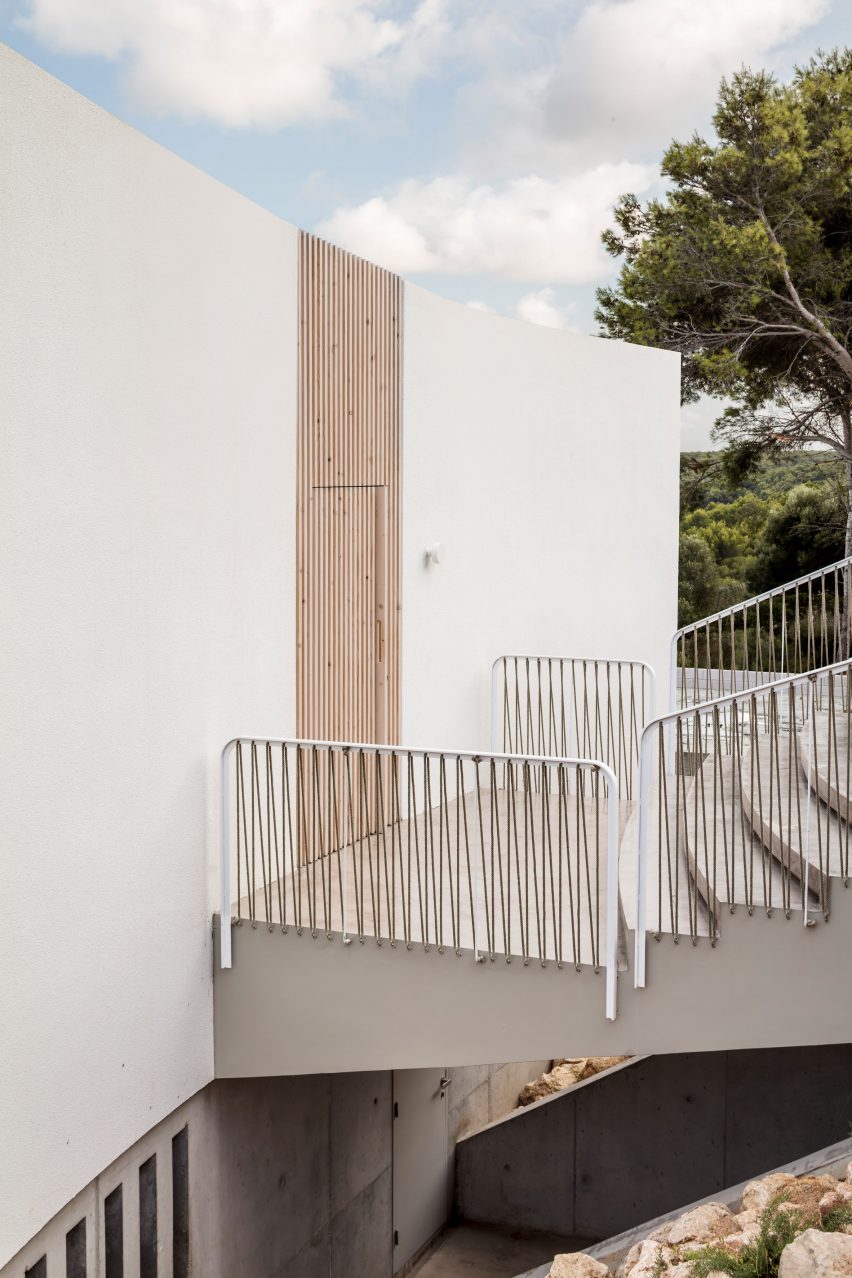 A stepped bridge leads to the home