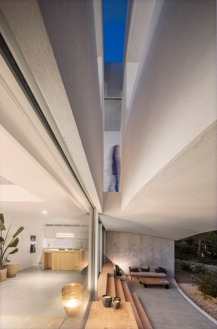 Openings in the ceiling provide glimpses between levels