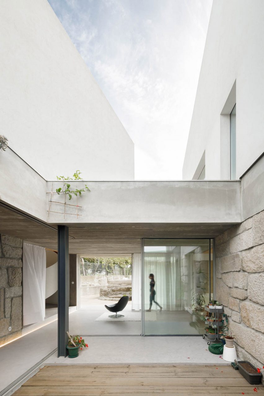 Glazed walls allow light to flood into the home