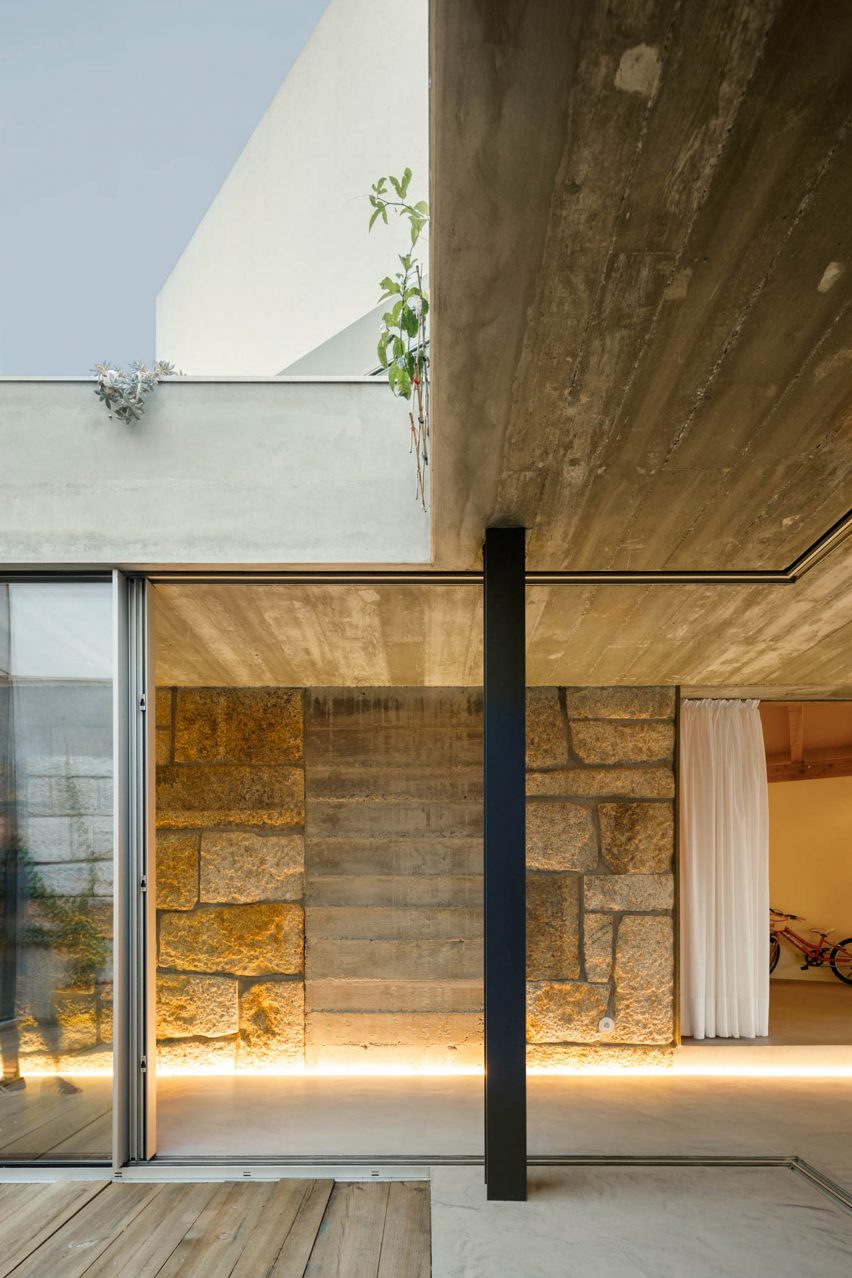 Sliding doors connect the interior and exterior