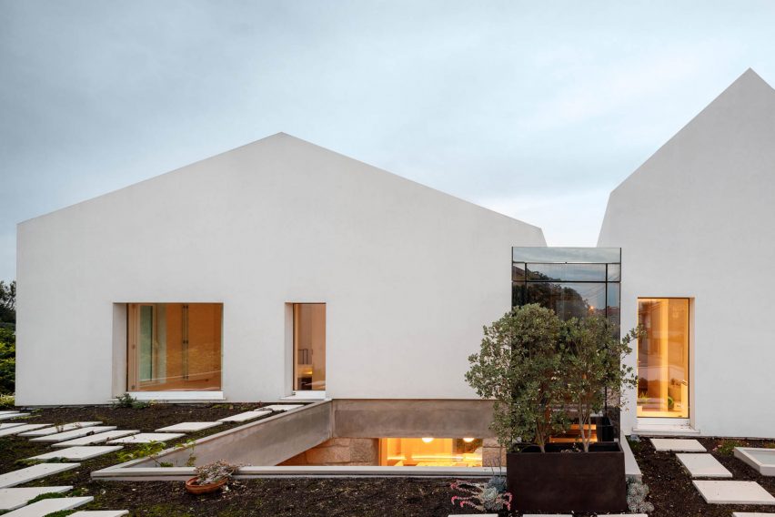 A garden is located on the roof of the home