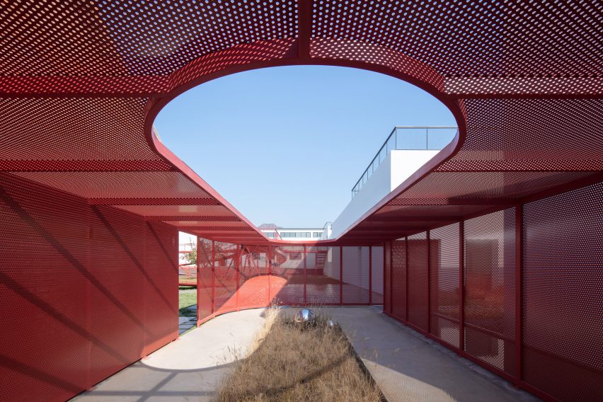 A garden enclosed within a steel mesh structure