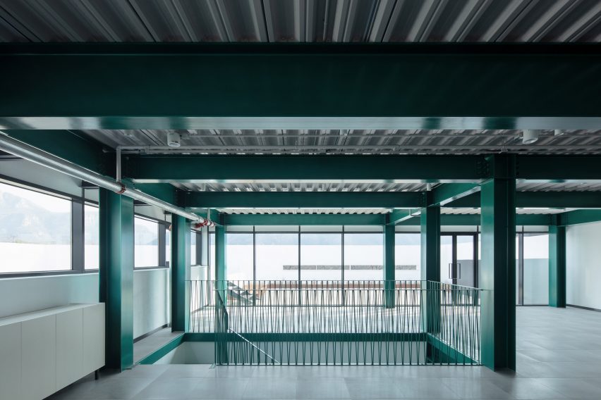 An interior with green-painted steel
