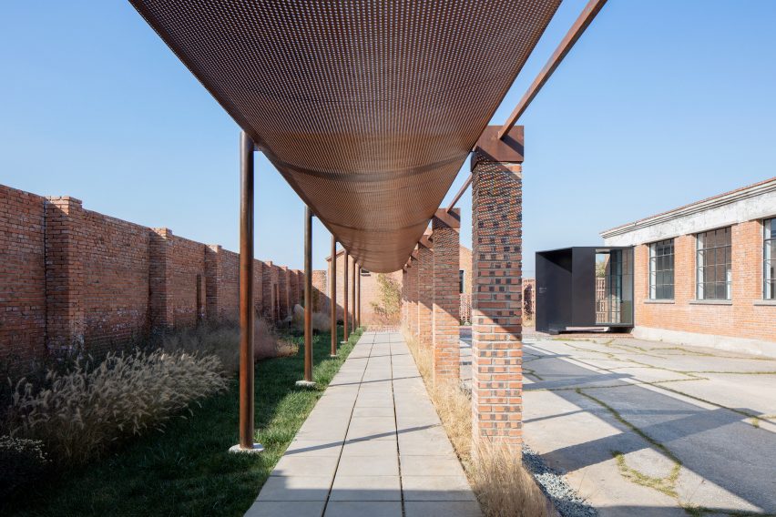 Walkways covered with mesh panels