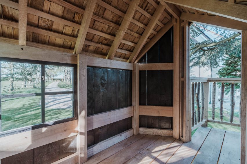 Treehouse interior looking out onto home driveway