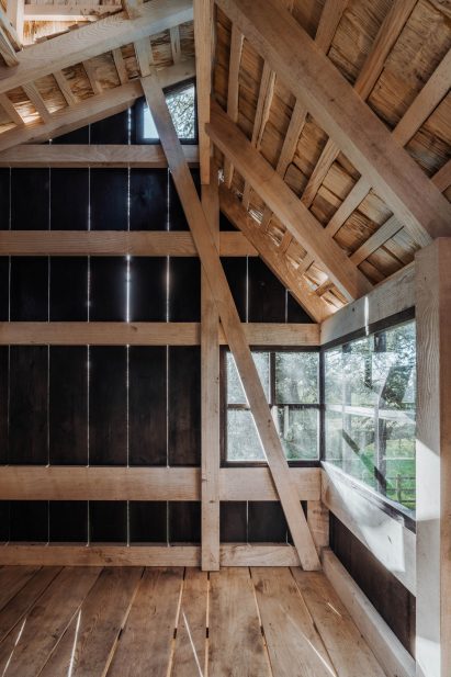 Treehouse interior showing English ash frame and scorched larch cladding