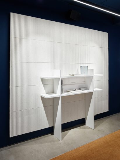 White acoustic panel with shelving