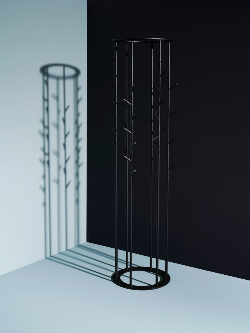 A black circular coat stand
