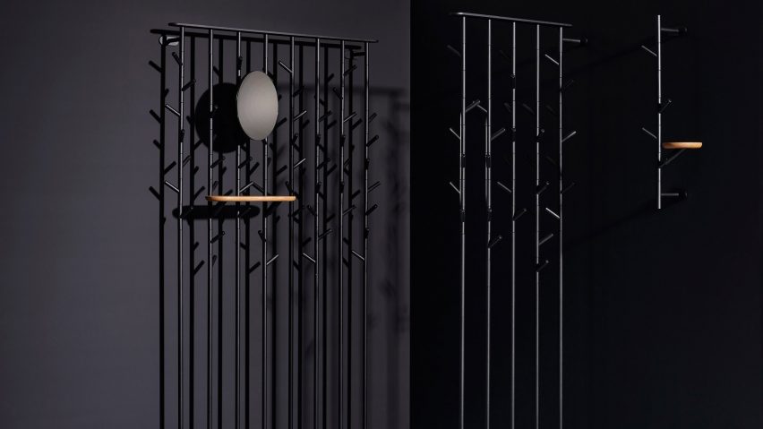 Three black metal coat stands by Schönbuch