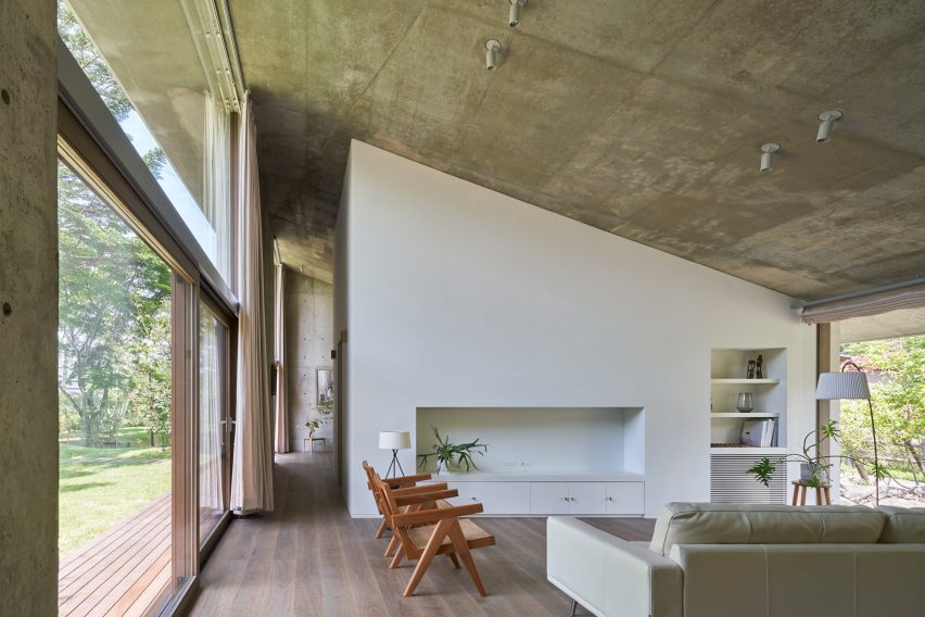Living room of Symbiotic House for Life After Retirement by READ & Architects