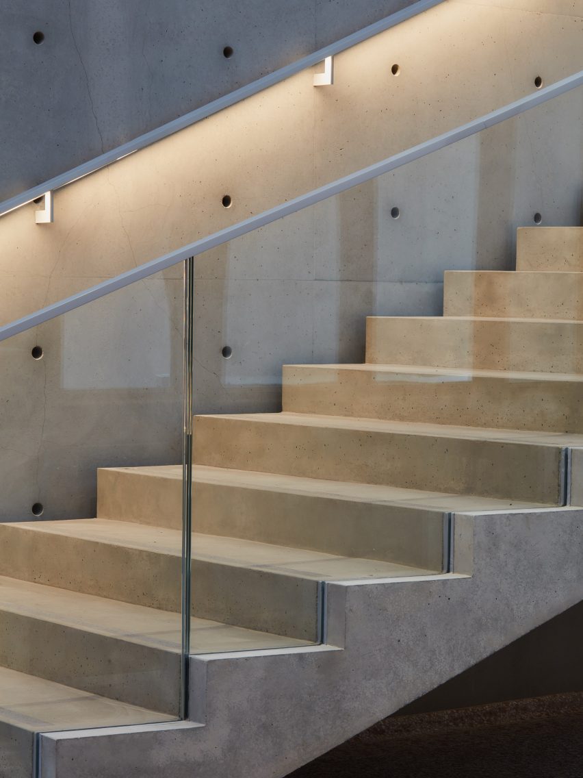 The stairs have a concrete finish
