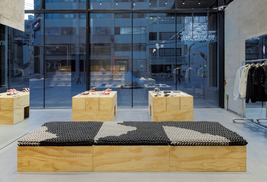 Textile-covered plywood bench in Vans store
